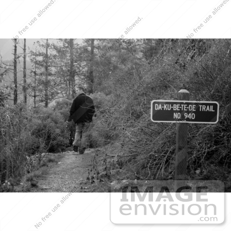 #572 Black and White Photograph of a Man Walking on Da-Ku-Be-Te-De Trail by Jamie Voetsch