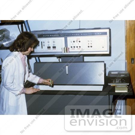 #5981 Picture of a Researcher Using an Older Model Liquid Scintillation Counter in a Laboratory by KAPD