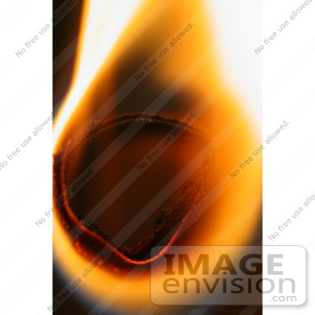 #610 Closeup Picture of Ear Coning Candle Burning by Kenny Adams