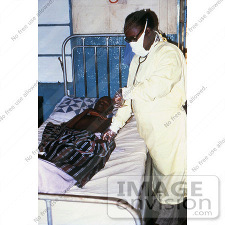 #6297 Picture of a Doctor Examining a Lassa Fever Patient in the Segbwema, Sierra Leone Clinic by KAPD
