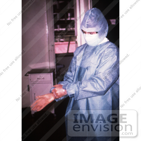 #6303 Picture of a Doctor Putting On Marburg Fever Protective Gear by KAPD