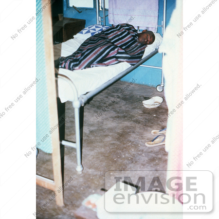 #6309 Picture of a Lassa Fever Patient Resting in the Male Wing of Segbwema, Sierra Leone Clinic by KAPD