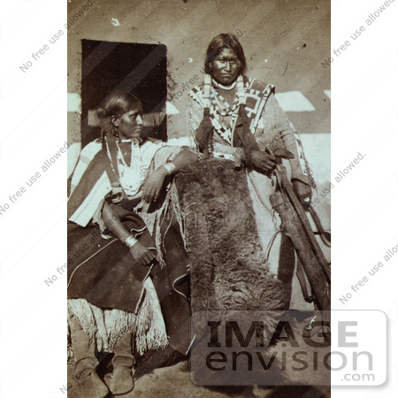 #6377 Stock photo of a Jicarilla Apache Brave and Wife by JVPD
