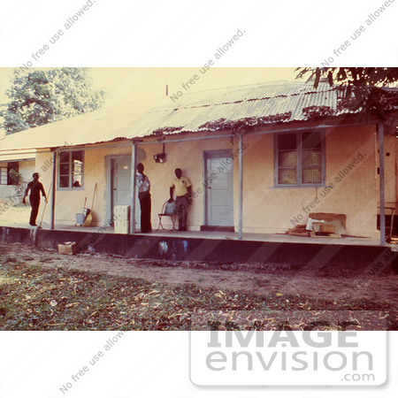 #6437 Picture of a Staff Members Standing Near the Entrance to the Kenema Laboratory in Sierra Leone by KAPD