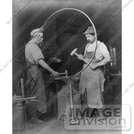 #6548 Blacksmiths Making a Wagon Wheel by JVPD