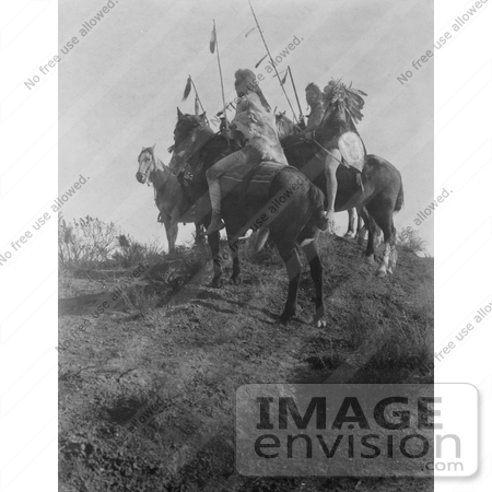 #7088 Stock Photography: Apsaroke Men on Horses, Holding Spears by JVPD