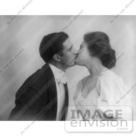 #7459 Stock Image of a Man and Woman Kissing by JVPD