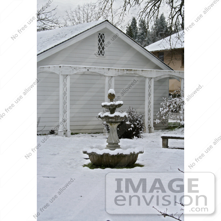 #746 Image of a Birdbath in a Snowy Garden by Jamie Voetsch