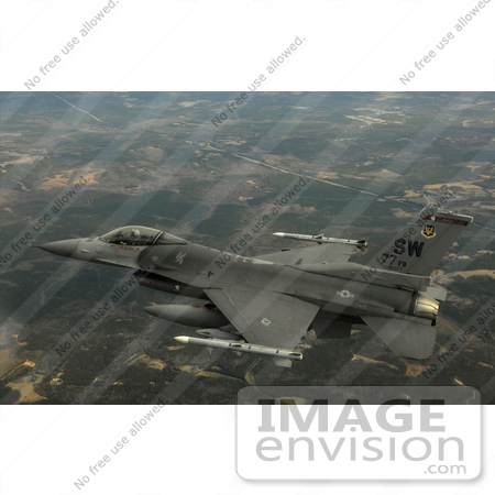 #7517 Stock Picture of an F-16CJ Fighting Falcon in Flight, Military Aircraft by JVPD