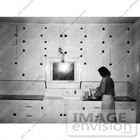 #8201 Picture of a Woman in a Kitchen by JVPD