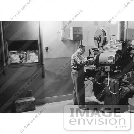 #8343 Picture of Man Using Movie Projector by JVPD