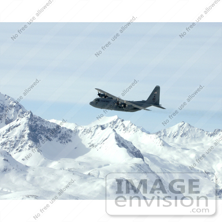 #8995 Picture of a C-130 Hercules Over Alaska Range by JVPD