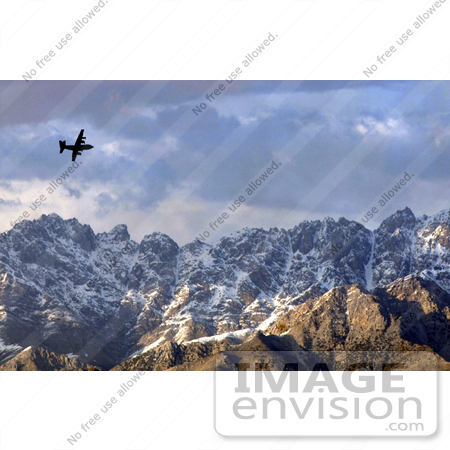 #8996 Picture of a C-130 Hercules by Mountains by JVPD