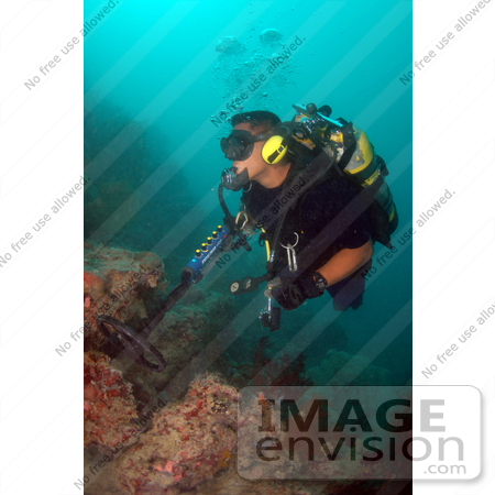 #9166 Picture of a Man Using an Underwater Metal Detector by JVPD