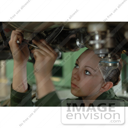 #9171 Picture of a Female Soldier Working on a Jet Engine by JVPD