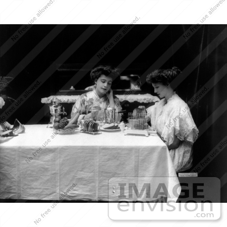 #9667 Picture of Two Women Using a Toaster at a Table by JVPD