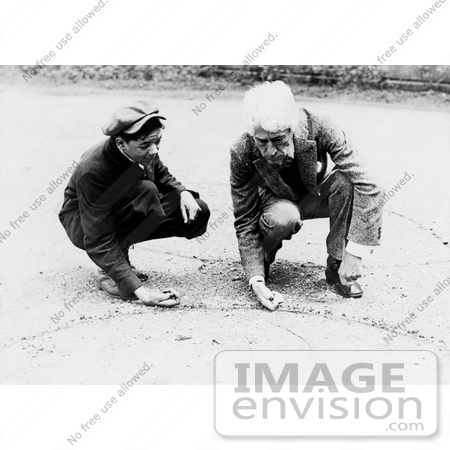 #9823 Picture of a Man Showing a Boy How to Shoot Marbles by JVPD