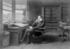 #12257 Picture of Charles Dickens Seated at a Desk by JVPD