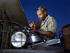 #12752 Picture of an African American Mechanic Working on an Air Filter by JVPD