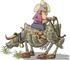 #14618 Texan Cowboy Man Seated Backwards on a Steer, The Reins Tied to the Tail Clipart by DJArt