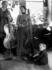 #16482 Picture of a Family of 3 With Parents Posed With Cellos and Son on the Floor by JVPD