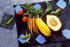 #17133 Picture of Veggies (Pease, Tomatoes, Carrots, Squash, Spinach and Green Beans) on Marble Cutting Boards on a Counter Top by JVPD