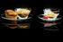 #17134 Picture of Two Plates on a Black Mirrored Background, Each Plate With a Bowl of Cereal, One With Two Muffins and the Other With a Strawberry by JVPD
