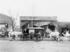 #18821 Photo of Horse Drawn Carriages and Hearses in Front of a Funeral Home by JVPD