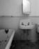 #20078 Stock Photography: Bathroom Sink, Toilet and Bath Tub Covered in Debri at the Ormond Hotel by JVPD