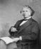 #21219 Stock Photography of Charles Sumner Seated With a Book in His Lap and Holding Spectac by JVPD