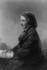 #21246 Stock Photography of Harriet Beecher Stowe, Author of Uncle Tom’s Cabin, Holding a Pencil and Notebook in Her Lap by JVPD