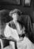 #21255 Stock Photography of Jeannette Rankin Sitting in a Chair, Her Hands in Her Lap by JVPD
