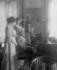 #21277 Stock Photography of Samuel Clemens/Mark Twain Playing a Piano For His Wife, Clara Clemens and Marie Nichols by JVPD