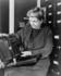 #26768 Stock Photography of Frances Benjamin Johnston Holding and Looking at Her Camera by JVPD