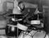 #27012 Stock Photography of a Young African American Man Playing The Drums And Entertaining In A Juke Joint In Memphis, Tennessee In 1939 by JVPD