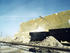 #30946 Stock Photo of an Excavator Loading Railroad Cars With Scoops Of Sulphur From A Vat At The Freeport Sulphur Company In Hoskins Mound, Texas by JVPD