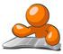 #34283 Clip Art Graphic of an Orange Guy Character Reading Through Articles And Classifieds In The Newspaper by Jester Arts