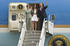 #35223 Stock Photo of President George W. Bush, First Lady Laura Bush And Daughter Barbara Bush Waving As They Exit Air Force One by JVPD