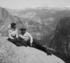 #41172 Stock Photo Of A Couple Relaxing On A Rock Cliff With A View Of The Cap Of Liberty, Nevada Falls And The Sierras From Eagle Peak, Yosemite National Park, California by JVPD