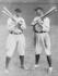 #41244 Stock Photo of Detroit Tigers Baseball Player, Ty Cobb, Standing And Holding Bats With Shoeless Joe, Joe Jackson, Of The Cleveland Naps by JVPD