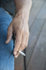 #53731 Royalty-Free Stock Photo of a Hand Holding Cigarette by Maria Bell