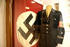 #682 Photograph of a Nazi Flag and Uniform on Display by Jamie Voetsch