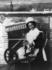 #9403 Picture of a Woman Using a Spinning Wheel by a Fireplace by JVPD