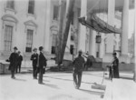 Coolidge Watching White House Repairs