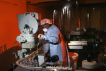 Lab Technician Using an Automated Vial Capping System