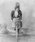 Madge Lessing on a Bike