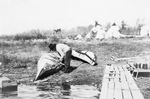 Ojibwa Indian Fixing Canoe
