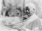 Miwok Woman Holding Sifting Basket