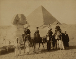 Tourists at Giza With The Great Sphinx and Pyramids