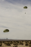 Army Soldiers Descending To Drop Zone